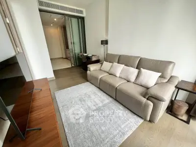 Modern living room with sleek leather sofa and stylish decor