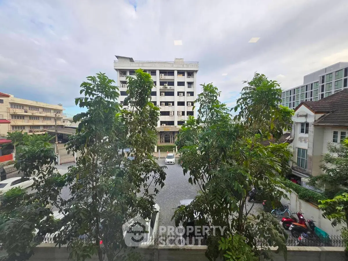 Scenic view of urban residential buildings with lush greenery