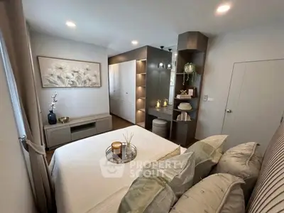 Elegant bedroom with modern decor and built-in storage, featuring soft lighting and stylish furnishings.