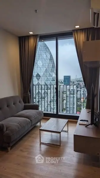 Modern living room with stunning city view and stylish furniture