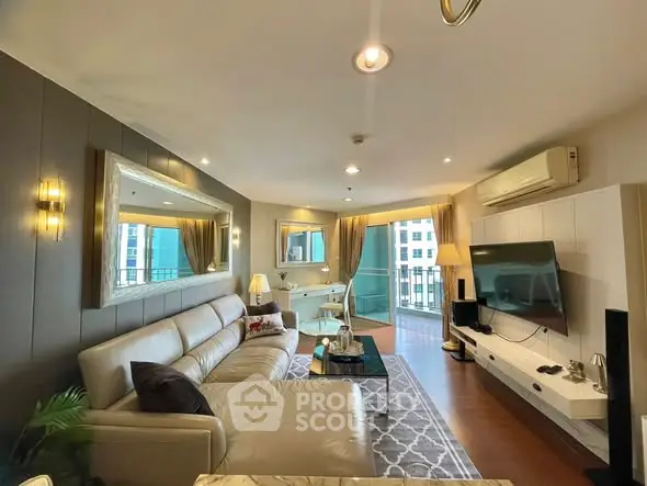 Luxurious living room with modern decor and balcony view