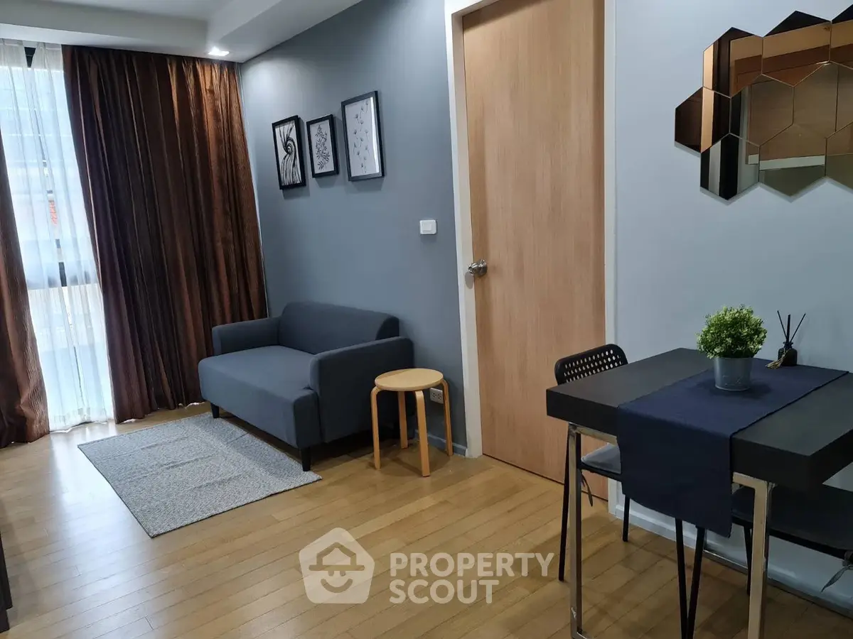 Modern living room with stylish decor and wooden flooring