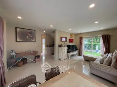 Spacious living room with garden view and modern decor