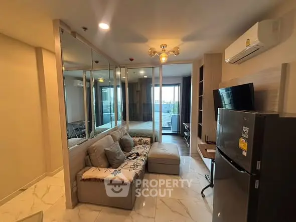 Modern living room with open layout and balcony view