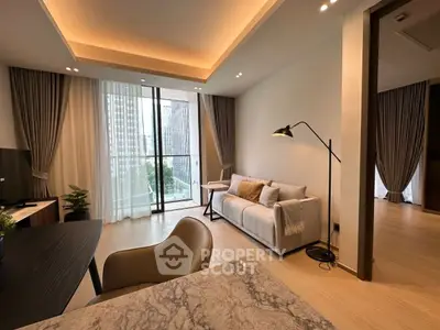 Modern living room with elegant decor and city view from large windows