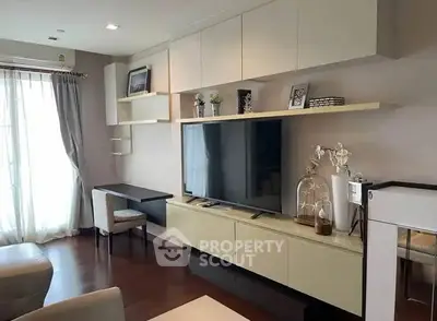 Modern living room with sleek TV unit and elegant decor
