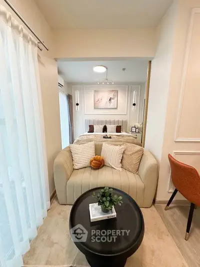 Chic studio apartment with cozy living area and stylish decor