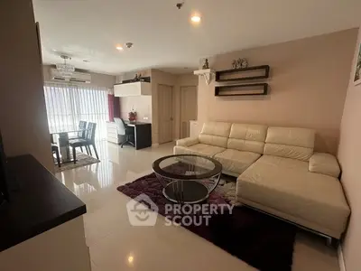 Spacious modern living room with elegant furniture and natural light