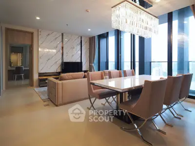 Luxurious modern living room with elegant dining area and stunning city view.
