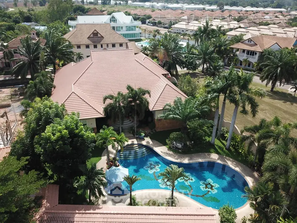 Luxurious villa with private pool and lush garden in tropical setting