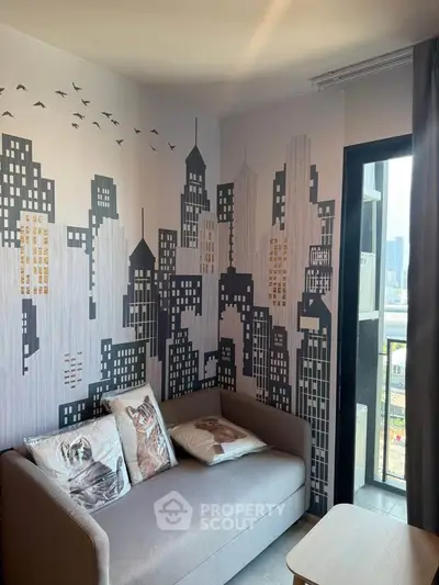 Stylish living room with cityscape wall art and cozy sofa near balcony.