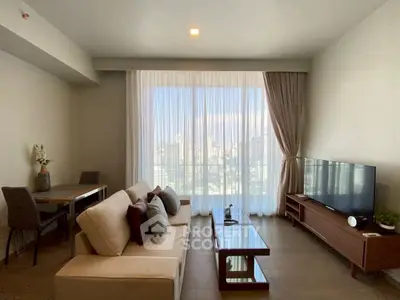 Spacious living room with city view, modern furniture, and natural light.