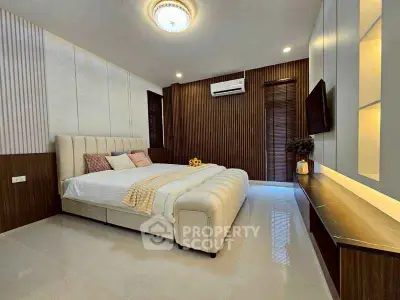 Luxurious modern bedroom with elegant decor and ambient lighting