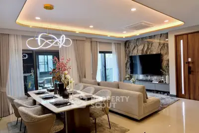 Luxurious modern living room with elegant dining area and stylish lighting