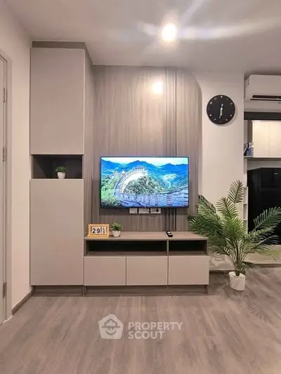 Modern living room with sleek TV unit and stylish decor