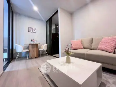 Modern living room with cozy seating and dining area, perfect for relaxation and entertaining.