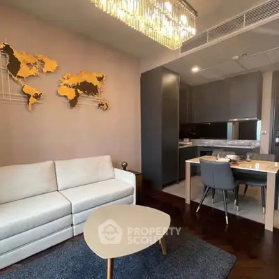 Modern living room with elegant decor and open kitchen layout