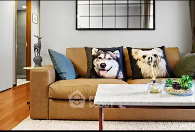 Stylish living room with cozy brown sofa and dog-themed cushions, modern decor and elegant mirror.