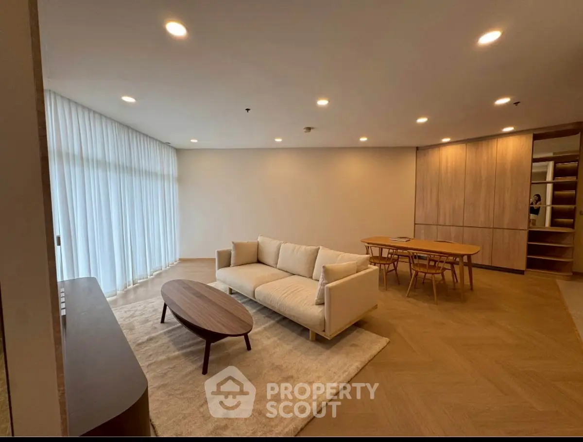 Spacious modern living room with elegant furniture and natural light