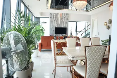 Luxurious modern living room with elegant dining area and stylish decor