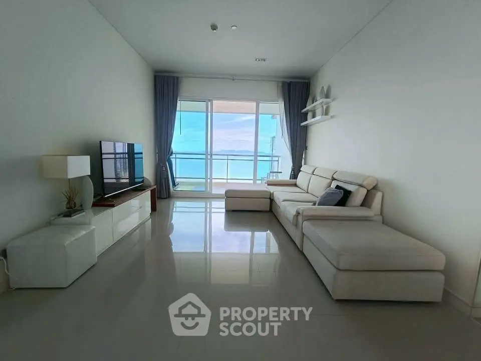 Spacious modern living room with ocean view and elegant furnishings