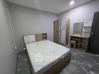 Modern bedroom with marble accents and sleek furniture design