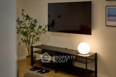 Modern living room with sleek TV setup and stylish decor