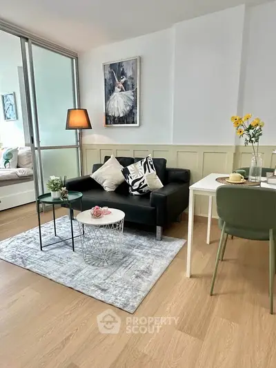 Chic modern living room with stylish decor and cozy seating area, perfect for relaxation and entertaining.