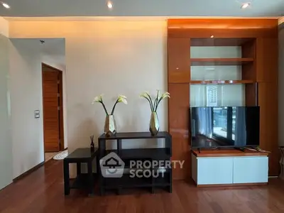 Modern living room with sleek wooden furniture and stylish decor