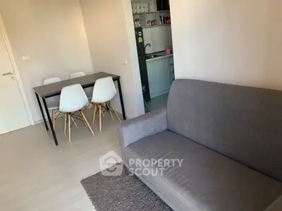 Modern apartment interior with cozy living room and dining area