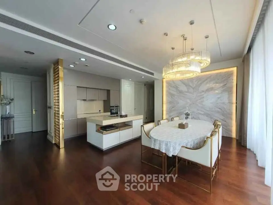 Luxurious modern kitchen with elegant dining area and stylish lighting
