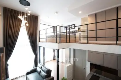 Modern loft apartment with high ceilings and stylish interior design