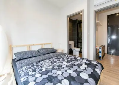 Modern bedroom with ensuite bathroom and stylish decor