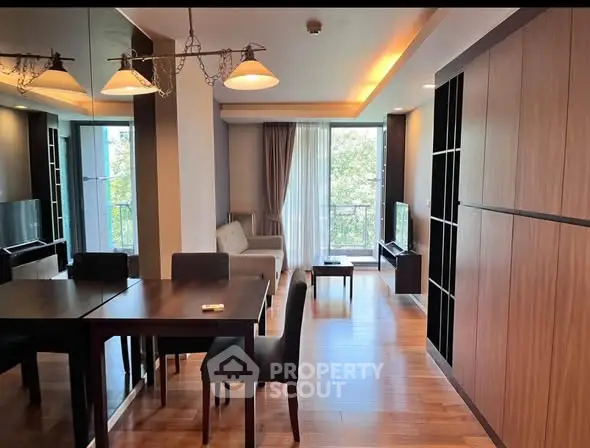 Modern living room with elegant dining area and natural light