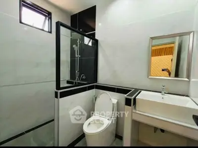 Modern bathroom with sleek design and spacious shower area