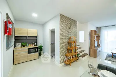 Modern open-plan living room with stylish decor and natural light