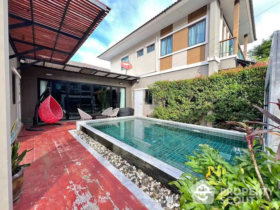 Modern home with private pool and lush garden, perfect for relaxation and entertaining.