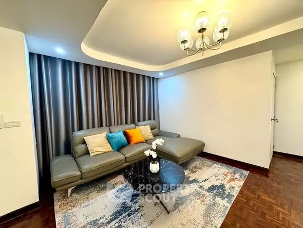 Modern living room with stylish sofa and elegant lighting