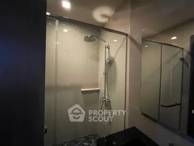 Modern bathroom with sleek shower design and elegant fixtures