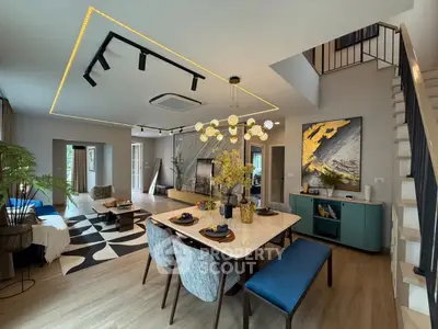 Luxurious modern living room with elegant dining area and stylish decor