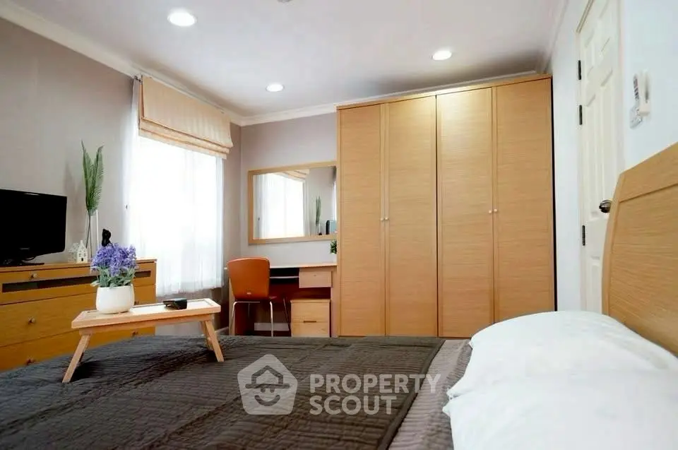 Cozy bedroom with modern furniture and natural light