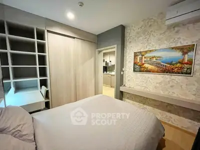 Cozy bedroom with built-in storage and elegant decor in modern apartment