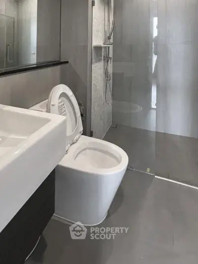 Modern bathroom with sleek design and glass shower enclosure