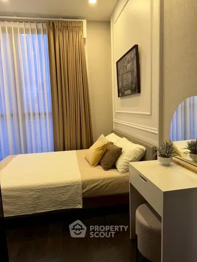 Cozy bedroom with modern decor and natural light