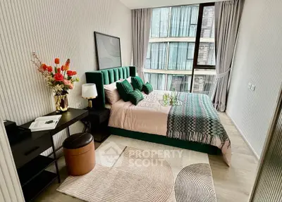 Luxurious modern bedroom with large window and stylish decor in urban apartment