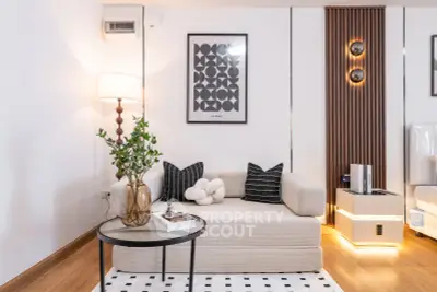 Stylish modern living room with cozy sofa and elegant decor