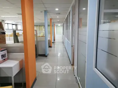 Spacious office corridor with modern design and vibrant colors