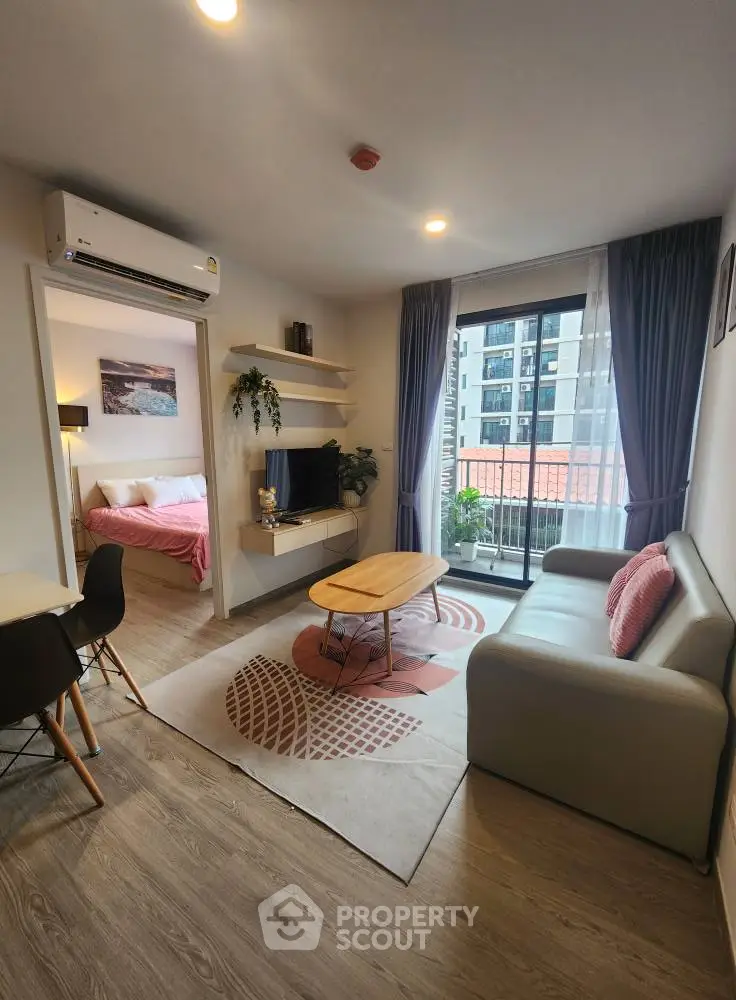 Modern living room with balcony view and stylish decor