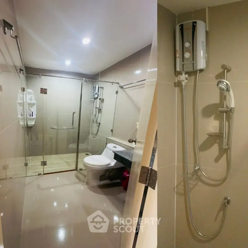 Modern bathroom with glass shower enclosure and sleek fixtures