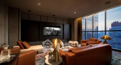 Luxurious living room with stunning city view, elegant leather sofas, and modern decor in a high-rise apartment.